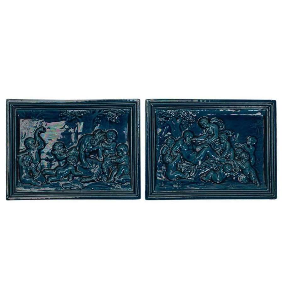 Pair of Burmantofts Faience Bacchanalian Blue Tiles